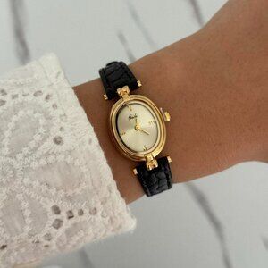 SKU0124 Casual Gold Black Women Fashion Oval watch Stainless steel + gift bag